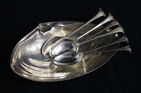 A sterling silver shell shaped dish and a set of six silver teaspoons.